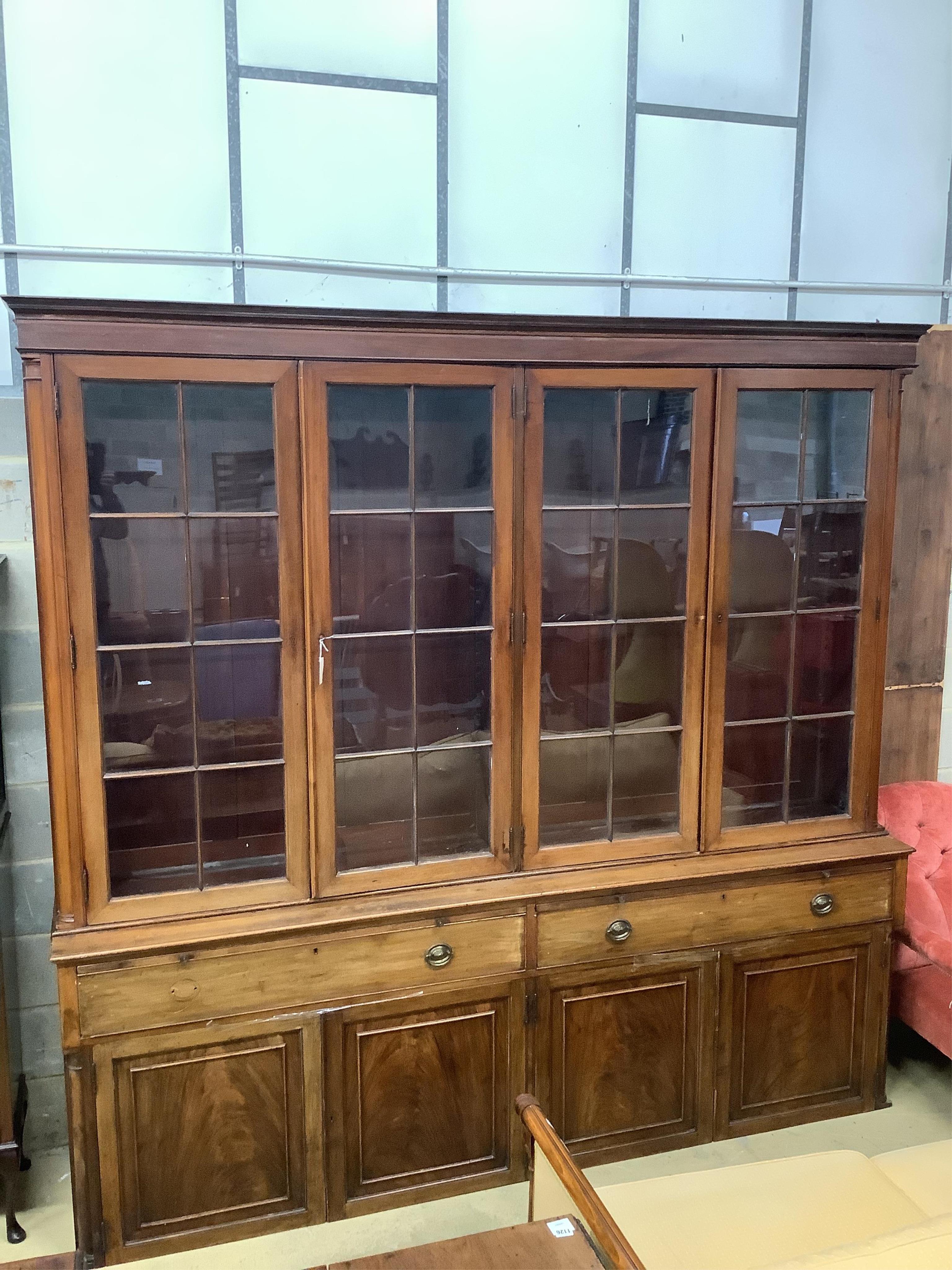 A Victorian mahogany library bookcase, width 251cm, depth 49cm, height 242cm